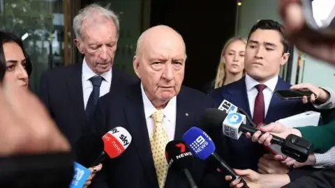 Sexual Assault Accusations Against Top Australian Radio Host Reduced